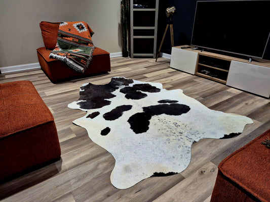 Cowhide rug 7'7" x 6'9" (R#102)